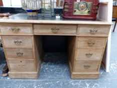 A VICTORIAN PALE OAK PEDESTAL DESK.