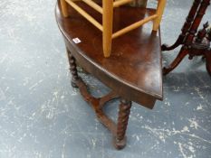 A WALNUT CORNER TABLE.