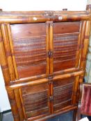 AN ORIENTAL BAMBOO FOUR DOOR CABINET