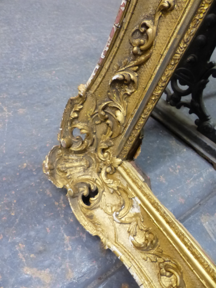 A LARGE VICTORIAN SWEPT GILT PICTURE FRAME IN THE FRENCH STYLE. REBATE 69 x 99.5cms. - Image 4 of 8