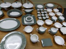 AN EXTENSIVE WEDGWOOD DINNER SERVICE TO INCLUDE PLACE SETTINGS, SERVING PIECES,ETC.