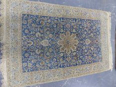 A PERSIAN NAIN RUG. 195 x 118cms.