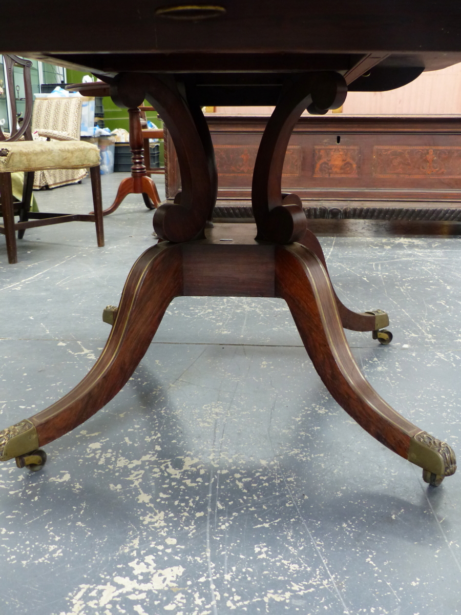 A REGENCY ROSEWOOD AND BRASS INLAID TILT TOP BREAKFAST TABLE ON QUADRUPED SABRE LEGS. 98 x 140 x H. - Image 2 of 14