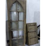 A PAIR OF PINE GOTHIC ARCH GLAZED PANEL DOORS, EACH 68 x 207cms. TOGETHER WITH THREE SECTIONS OF