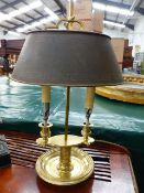 A REGENCY STYLE GILT BRASS TWO LIGHT STUDENT'S OR DESK LAMP WITH A TOLE DECORATED TIN SHADE TOGETHER