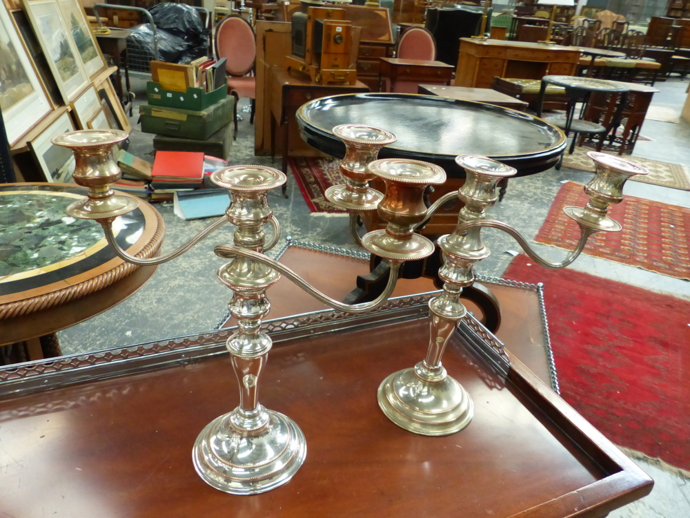 FIVE SILVER PLATE ON COPPER THREE BRANCH CANDELABRA AND TWO FURTHER CANDLESTICKS. - Image 3 of 4