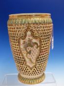 A FISCHER OF BUDAPEST RETICULATED POTTERY VASE, THE TAPERING SIDES WITH FOUR SHIELDS PAINTED IN