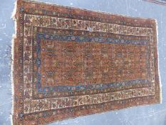 AN ANTIQUE PERSIAN TRIBAL RUG. 200 x 126cms.
