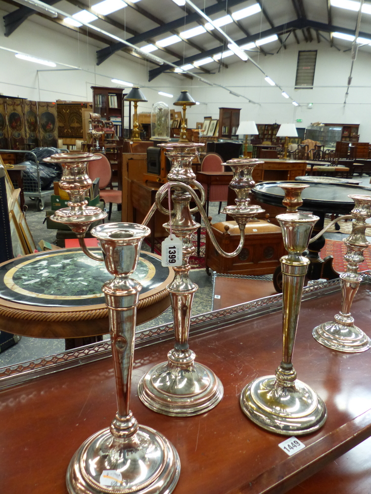 FIVE SILVER PLATE ON COPPER THREE BRANCH CANDELABRA AND TWO FURTHER CANDLESTICKS. - Image 2 of 4