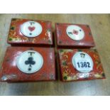 A SET OF FOUR GEORGIAN RED PAINTED WOOD GAMES COUNTER BOXES/ BRIDGE MARKERS, CONTAINING RED AND WHIT