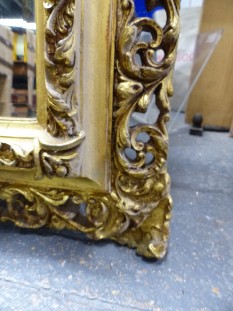 A BEVELLED GLASS RECTANGULAR MIRROR IN GILT GESSO PIERCED FOLIATE FRAME, OVERALL. 149 x 118cms. - Image 3 of 5