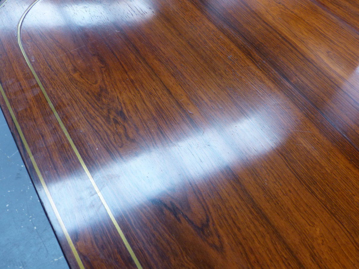 A REGENCY ROSEWOOD AND BRASS INLAID TILT TOP BREAKFAST TABLE ON QUADRUPED SABRE LEGS. 98 x 140 x H. - Image 8 of 14