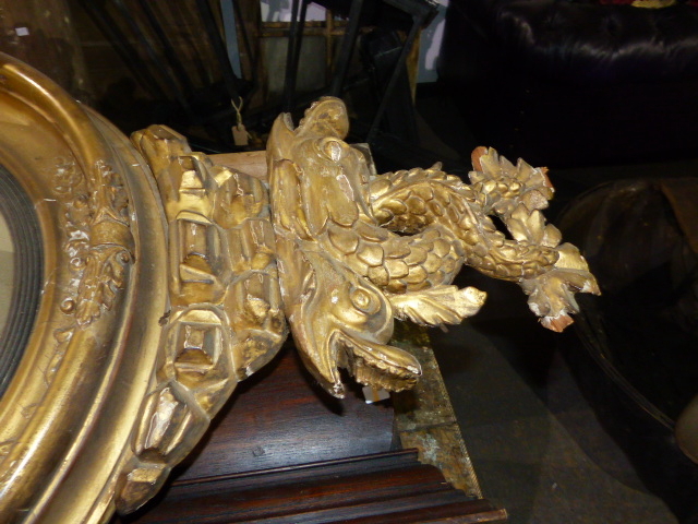 AN EARLY 19th.C.CARVED GILTWOOD CONVEX MIRROR WITH ENTWINED DOLPHIN CREST AND FLANKING PAIRS OF - Image 2 of 19