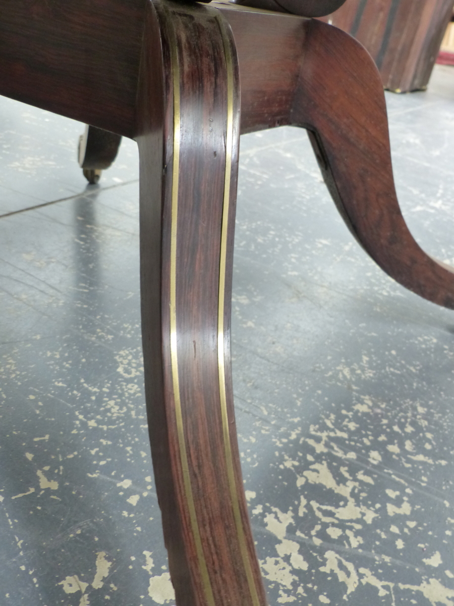 A REGENCY ROSEWOOD AND BRASS INLAID TILT TOP BREAKFAST TABLE ON QUADRUPED SABRE LEGS. 98 x 140 x H. - Image 14 of 14