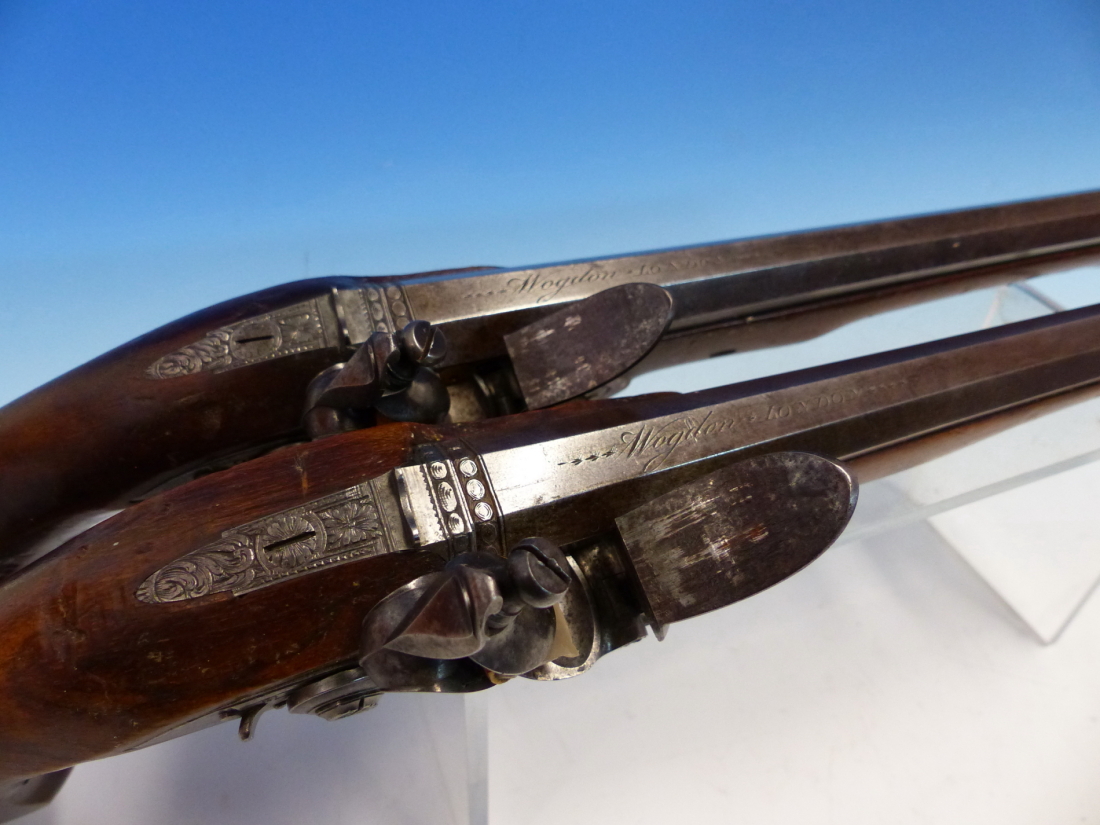 WOGDON LONDON, A PAIR OF FLINTLOCK PISTOLS, THE BRASS CAPS TO THE RAMRODS UNDER THE OCTAGONAL - Image 35 of 36
