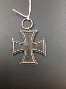 A 1914 GERMAN IRON CROSS WITH SUSPENSION RING.