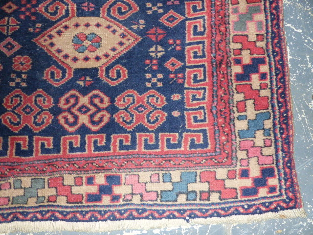 AN ANTIQUE TURKISH RUG. 150 x 95cms. - Image 2 of 5