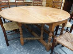 A BESPOKE OAK 18th.C.STYLE LARGE GATELEG DINING TABLE, EACH LEAF WITH DOUBLE GATE SUPPORTS. 182 x