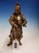 A PARCEL GILT AND SILVERED FIGURE OF GUANGWU, THE ARMOURED FIGURE STANDING WITH A WRAPPED SEAL IN