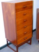 A.E.GOMME. A TEAK G-PLAN TALL CHEST OF SIX DRAWERS. 50 x 46 x H.105cms.