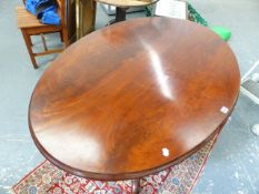 A 19th.C.FIGURED MAHOGANY OVAL LOO TABLE ON CARVED QUADRUPED SUPPORTS. 125 x 86cms.