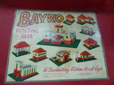A BAYKO BUILDING SET TOGETHER WITH A HORNBY 0 GUAGE LMS LOCOMOTIVE, TENDER, NINE BOXES OF ROLLING