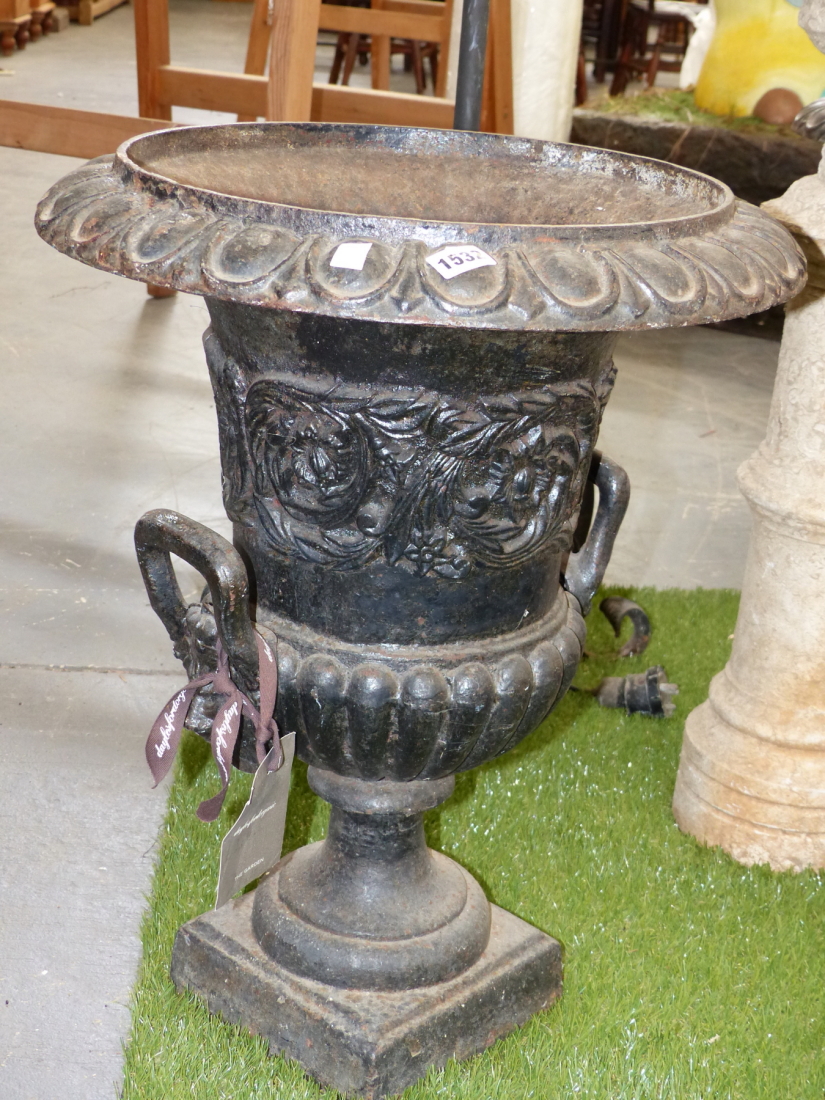 A PAIR OF OLD CAST IRON CLASSICAL VICTORIAN STYLE GARDEN URNS ON SQUARE BASES. Dia.48 x H.60cms.