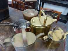 A LARGE VICTORIAN COPPER KETTLE, A BRASS KETTLE, THREE VICTORIAN BRASS WATER CANS AND A GRADUATED