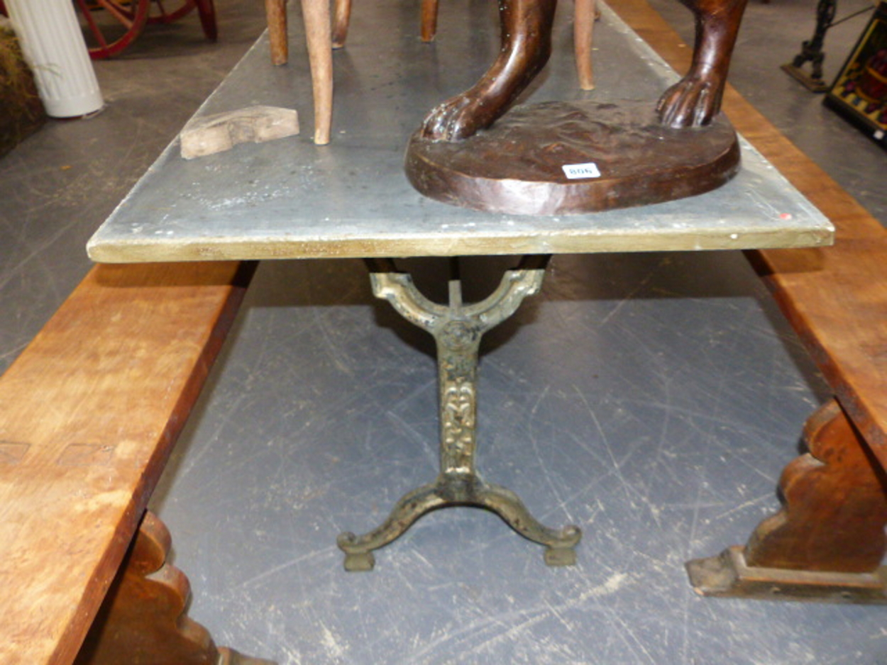 A SET OF THREE CAST IRON BASED TABLES WITH CAST IRON TRESTLE BASES AND ZINC WRAPPED TOPS. 69 x 210 x - Image 5 of 11