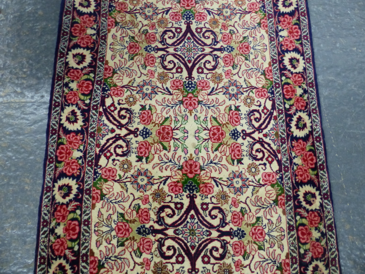 A PERSIAN FLORAL PATTERN SMALL RUNNER. 191 x 75cms. - Image 3 of 6