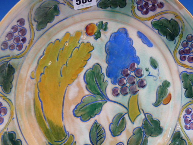 A DOULTON BRANGWYN WARE DISH WITH A WAVY BAND OF GRAPE VINES ENCLOSING A WHEATSHEAF, GRAPES AND - Image 4 of 10