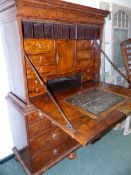 AN 18th.C.WALNUT FALL FRONT SECRETAIRE CABINET WITH WELL FITTED INTERIOR OF PIGEON HOLES AND DRAWERS