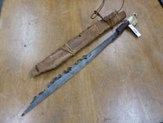 A DAYAK HEAD HUNTER'S SWORD AND WOODEN SCABBARD MOUNTED WITH BONE, THE SINGLE EDGED BLADE WITH