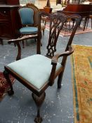 A SET OF SIX GEORGIAN STYLE MAHOGANY DINING CHAIRS WITH DROP IN SEAT PADS ON CARVED CABRIOLE LEGS