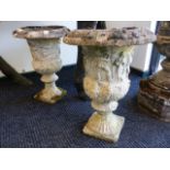 A PAIR OF COMPOSITE, CLASSICAL STYLE CAMPANA FORM GARDEN URNS