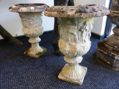 A PAIR OF COMPOSITE, CLASSICAL STYLE CAMPANA FORM GARDEN URNS