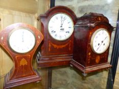 THREE EDWARDIAN MAHOGANY CASE CLOCKS, ONE WITH ANSONIA MOVEMENT. H 34cms. ANOTHER WITH JAPY FRERES