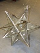 AN IMPRESSIVE LARGE STAR FORM HALL LANTERN WITH METAL FRAME AND GLASS PANELS. H.86cms TOGETHER