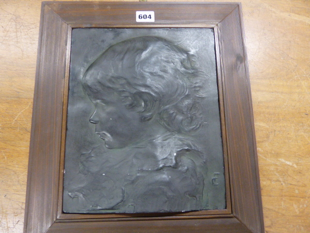 AN EARLY 20th.C. BRONZED PLASTER PROFILE OF A CHILD IN WOODEN FRAME, MONOGRAMMED F C. 41 x 31.5cms. - Image 2 of 3