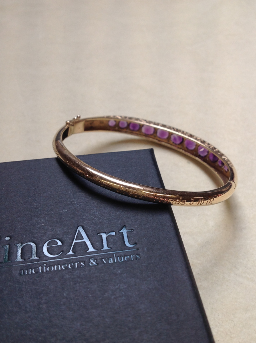 A 9ct GOLD AMETHYST AND DIAMOND CARVED HINGED BANGLE COMPLETE WITH FIGURE OF EIGHT SAFETY CLASP, - Image 10 of 14