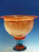 A COLOURED GLASS FOOTED BOWL, THE EVERTED ORANGE RIM ABOVE A MISTED HEMISPHERICAL BODY, THE BLUE