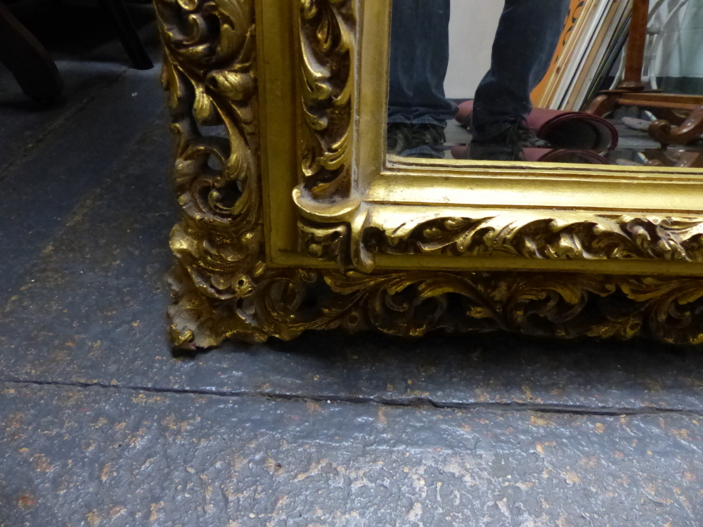 A BEVELLED GLASS RECTANGULAR MIRROR IN GILT GESSO PIERCED FOLIATE FRAME, OVERALL. 149 x 118cms. - Image 5 of 5