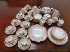 A SET OF TWELVE DERBY COFFEE CUPS AND SAUCERS TOGETHER WITH A SPODE TEN PLACE COFFEE SET PRINTED