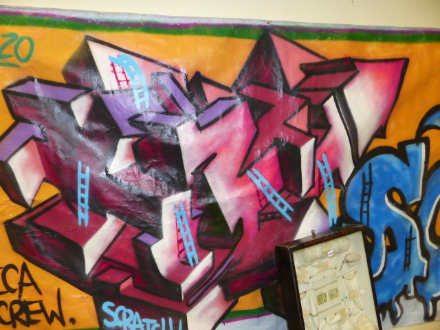 CONTEMPORARY SCHOOL. A GRAFFITI COMPOSITION, OIL ON UNSTRETCHED CANVAS. 157 x 258cms. - Image 6 of 7