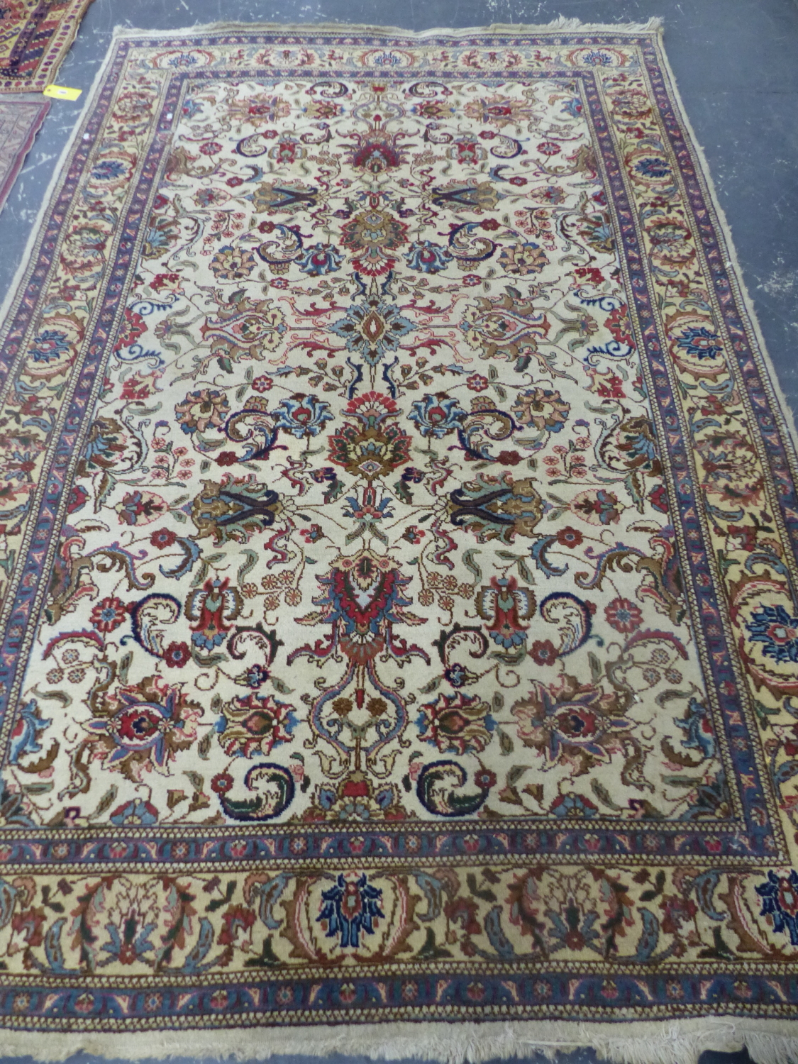 A PERSIAN TABRIZ CARPET. 315 x 200cms.