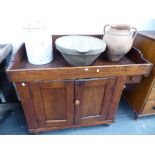 A 19th.C.AMERICAN PINE DRY SINK WITH RAISED BACK OVER PANEL DOORS AND SMALL DRAWER. 113 x 52 x H.