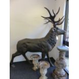 AN IMPRESSIVE PAIR OF CAST BRONZE LIFE-SIZE FIGURES OF STAGS. H.215cms.