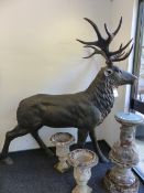 AN IMPRESSIVE PAIR OF CAST BRONZE LIFE-SIZE FIGURES OF STAGS. H.215cms.