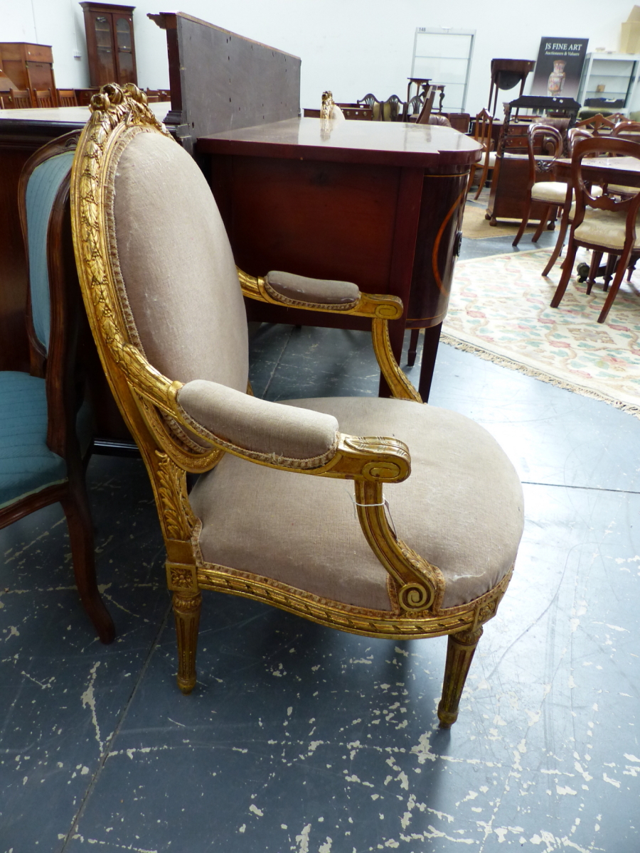 A PAIR OF FRENCH CARVED GILTWOOD LOUIS XVI STYLE SALON ARMCHAIRS WITH OVAL BACKS AND SHAPED SEATS ON - Image 2 of 6