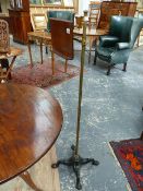 A 19th.C.CARTER'S PATENT LIBRARY READING STAND WITH BRASS SUPPORT ON CAST IRON BASE.